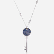 Kate & Mimi Medium Love Key with a Single Forevermark Diamond in LOVE's center and 85 Round Sapphires on the reverse side back view with chain
