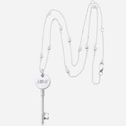 Kate & Mimi Mini Love Key with 1 Round Brilliant Diamond 0.05cts on one side and 58 Round Sapphires with 0.34cts set pavé style on the other front view with chain