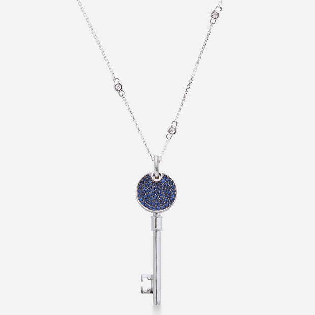 Kate & Mimi Mini Love Key with 1 Round Brilliant Diamond 0.05cts on one side and 58 Round Sapphires with 0.34cts set pavé style on the other back view close up with chain