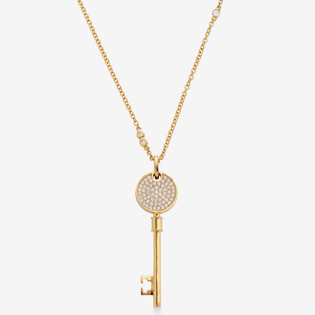 Kate & Mimi Mini Love Key with single round diamond on one side and round diamonds set pavé style on the other side back view with chain